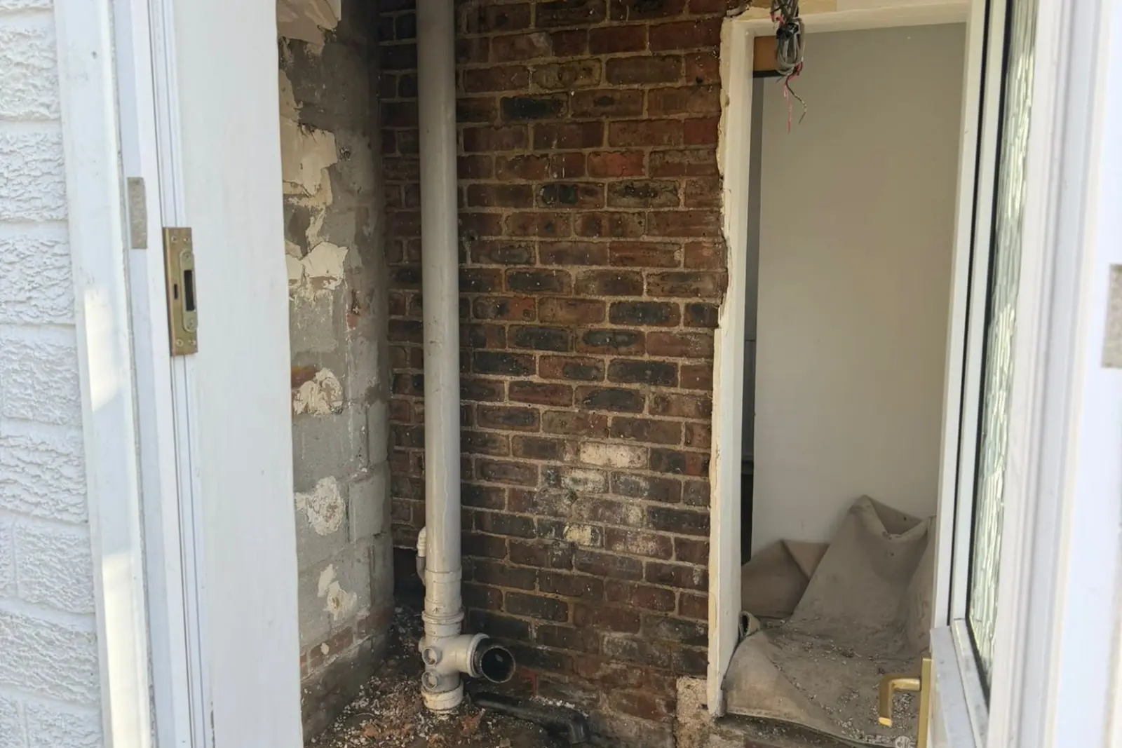 Rat contaminated insulation removed from under floor in Tang Hall York showing urine damage droppings requiring biohazard cleaning
